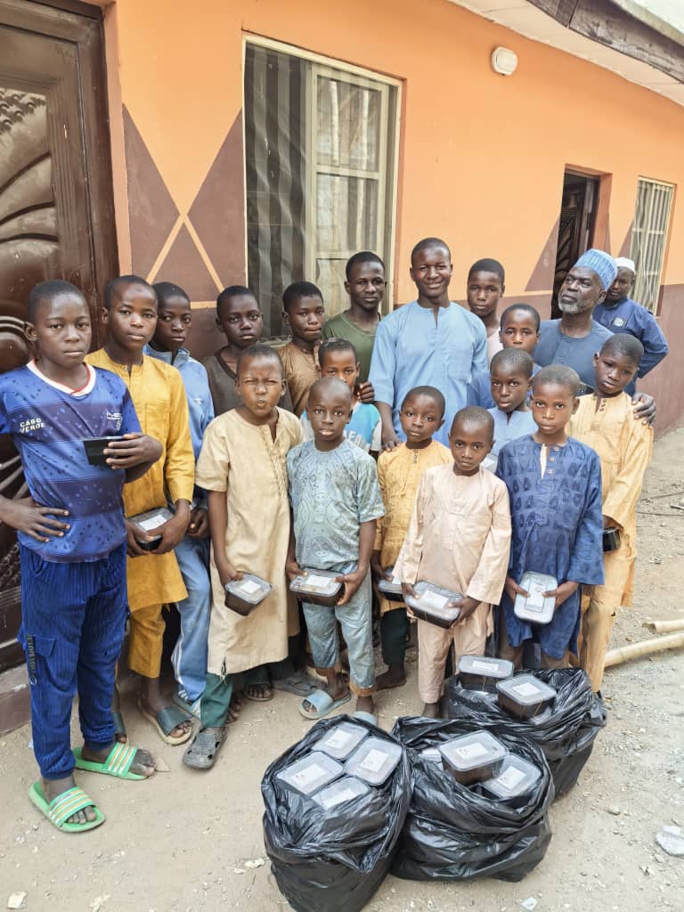 children feed during Ramadan